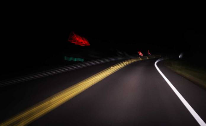 Blurred lines on a highway at night.